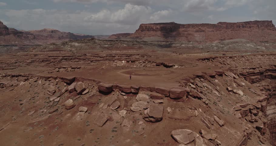 A man is hiking outdoors by himself in spring