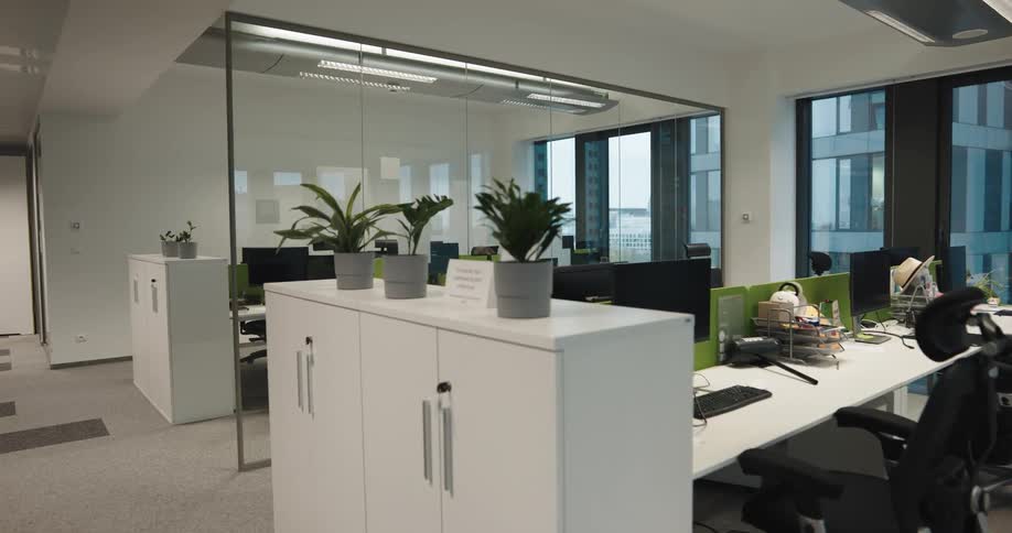 The interior of an empty office building is displayed