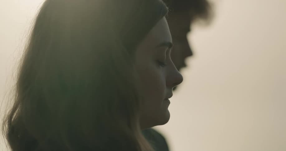 A man and woman are praying