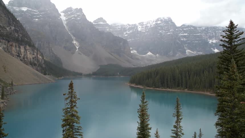 Aerial view of a lake before a mountain range