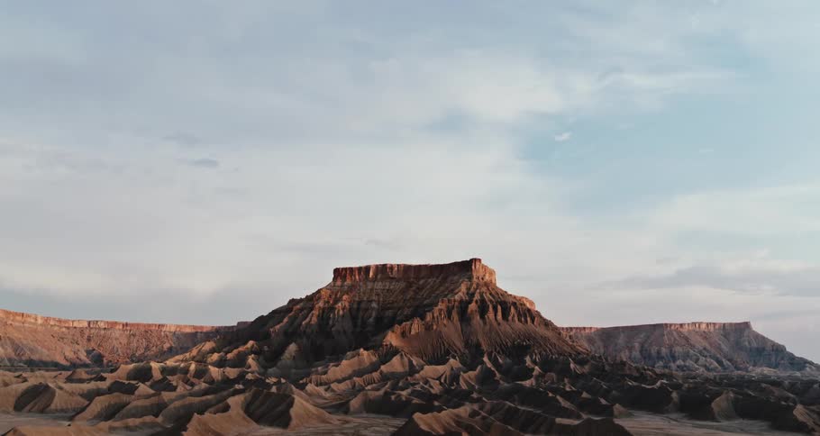 Wide open landscape view of a canyon is displayed