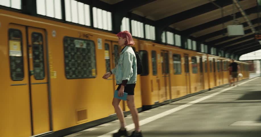 A woman boarding a train