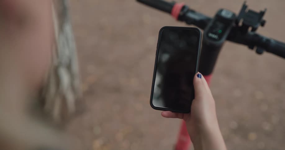 A person is typing on their cell phone