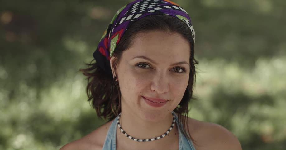 A portrait of a woman outside