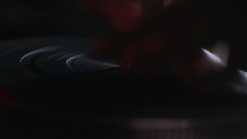 A record is put on a turntable