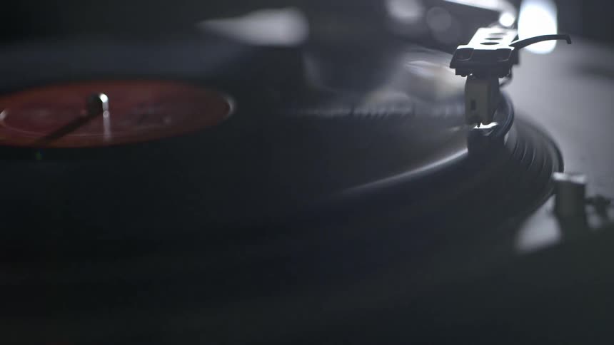 A record player is playing a record