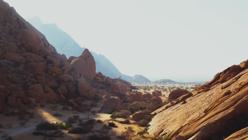 Rock strewn desert mountains on a sunny day
