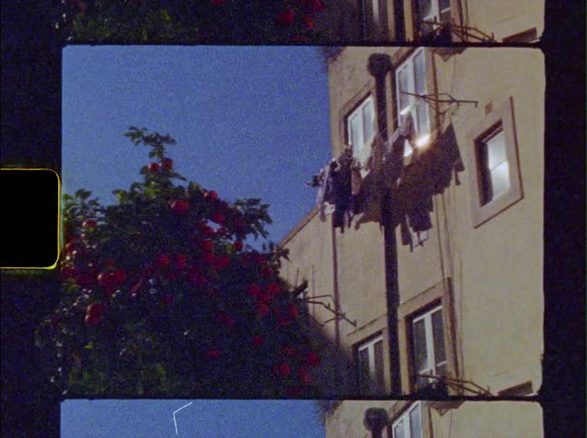 Clothes are hanging form the upstairs window