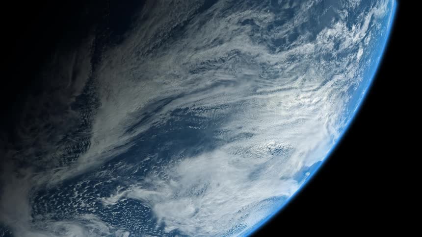 Planet earth spins around in the night sky