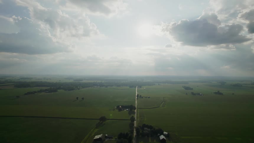 Aerial view of a rural landscape with some houses