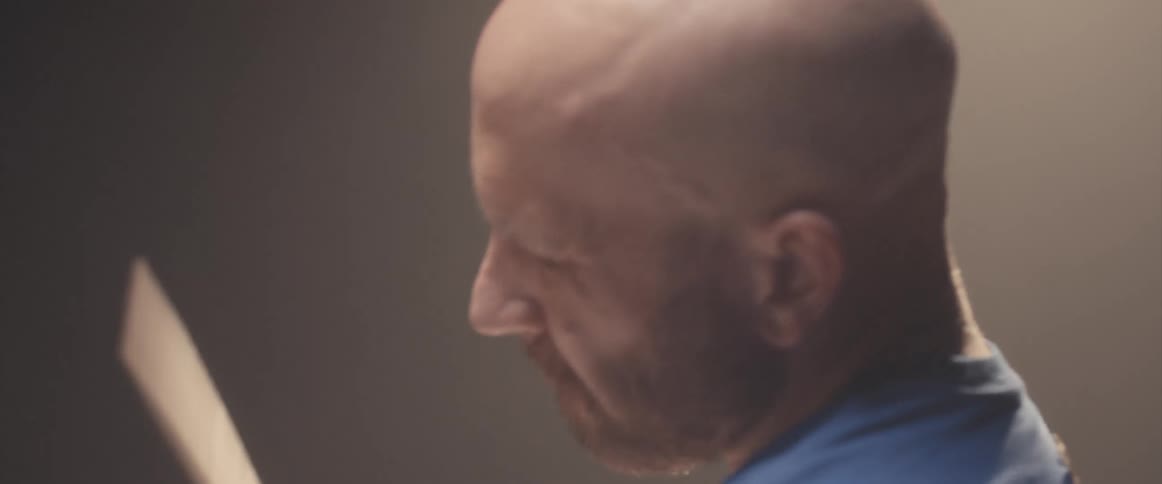 Close up view of a man playing the drums