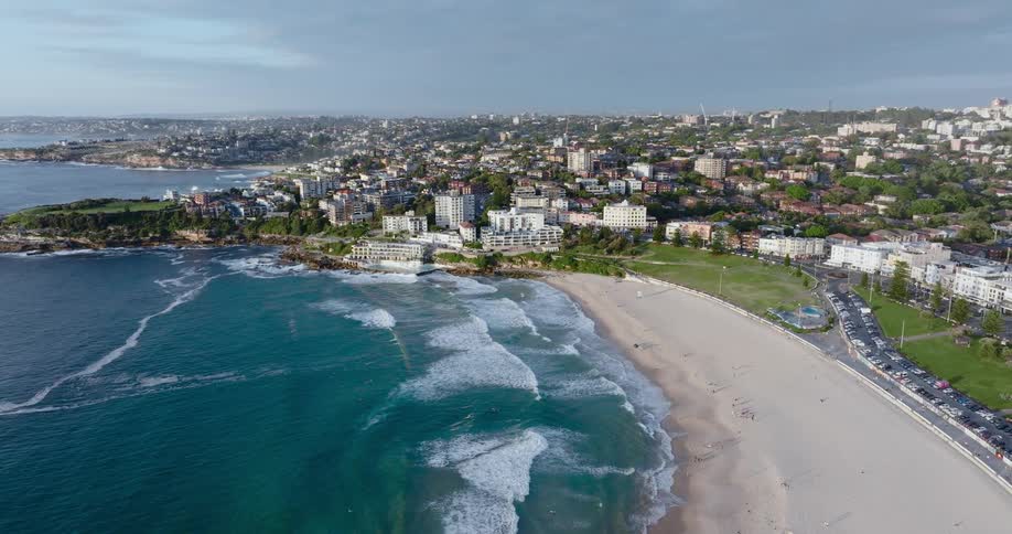 Aerial view of a waterfront residential area in front of a beach close to the ocean