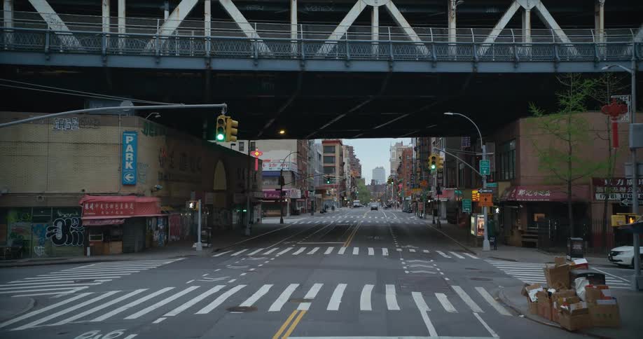 A train platform sits above businesses downtown
