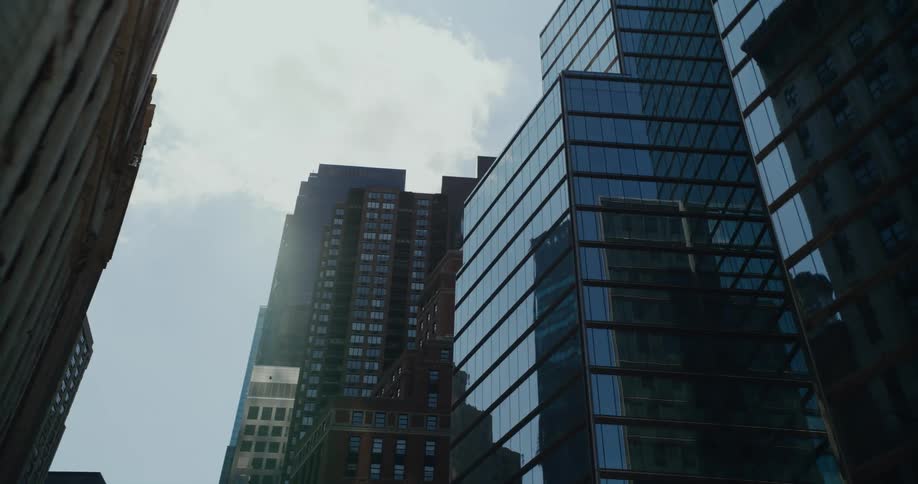 The sky is filled with tall buildings