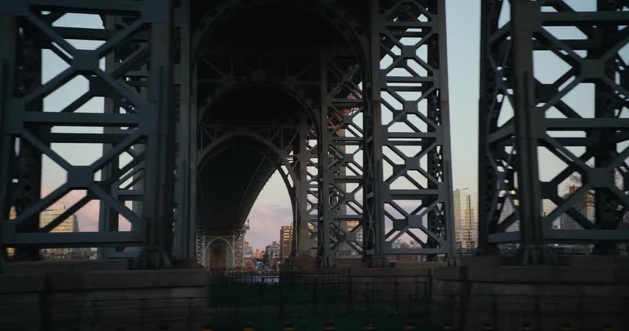A large bridge leads to the city