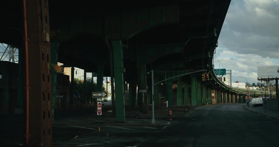 A view of a bridge outdoors in a city