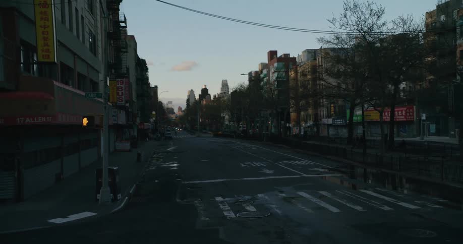An empty street in a downtown city is displayed