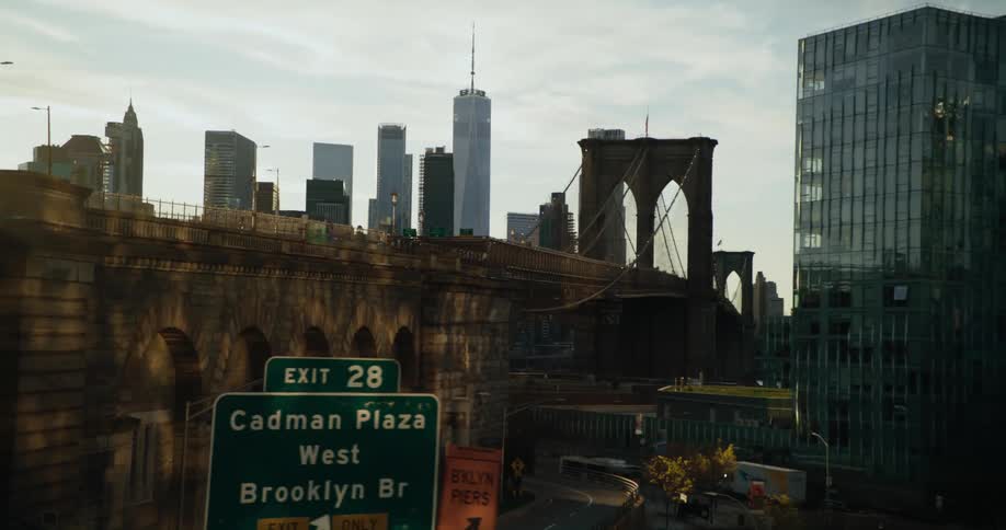 A view of a city with a bridge