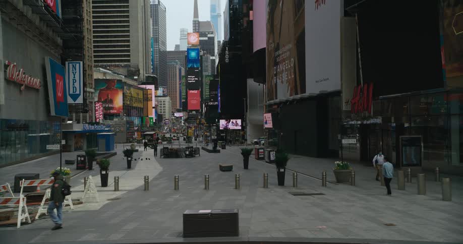 People are walking down the street