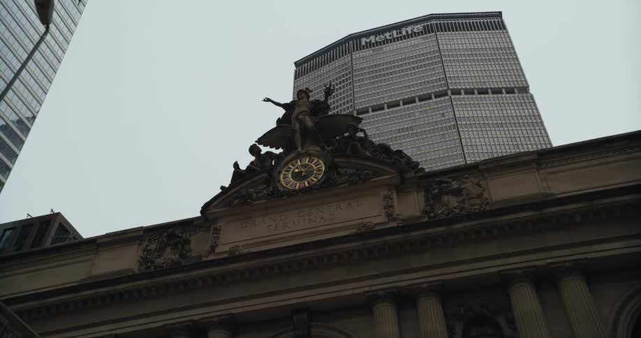 The grand central terminal in front of the metlife building in new york city