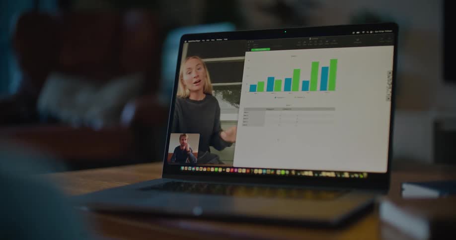Man and woman are video chatting on a laptop