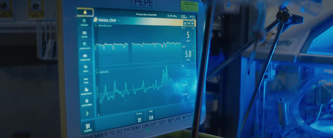 Ekg runs in hospital next to icu incubator chamber
