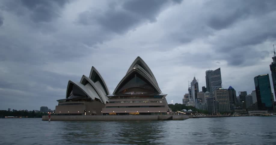 A view of a downtown city near a body of water is displayed