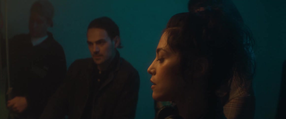 Filmmakers are working by a monitor
