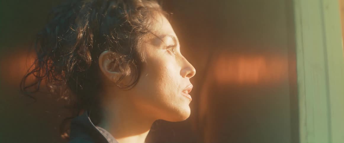A woman in a hallway
