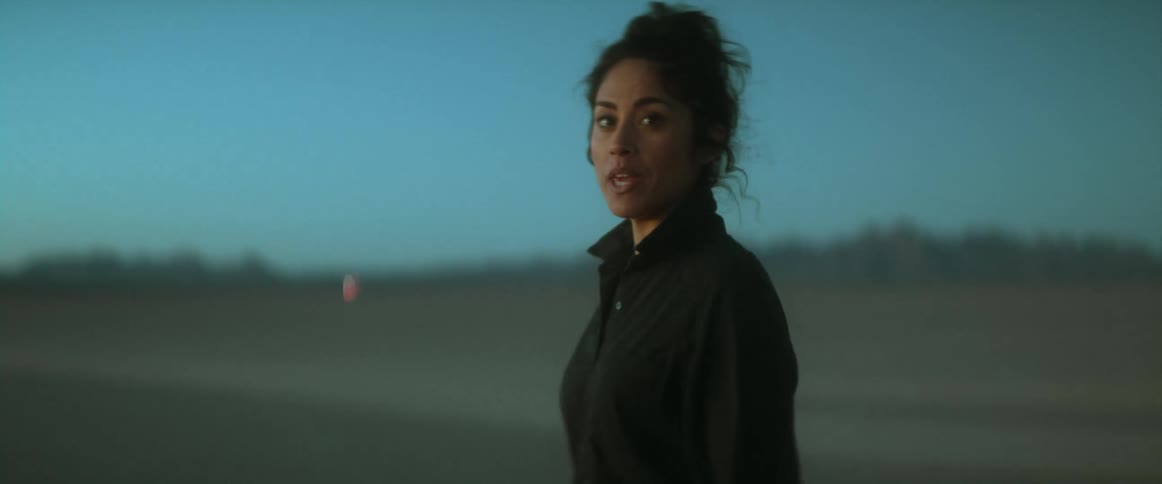 A woman walking outdoors