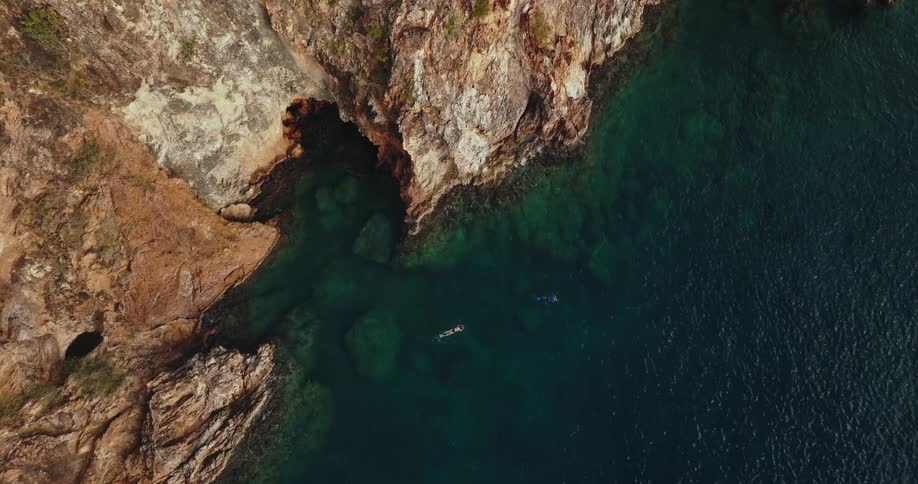 A person swimming in the ocean
