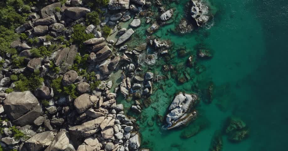 A rocky ocean coastline during the day