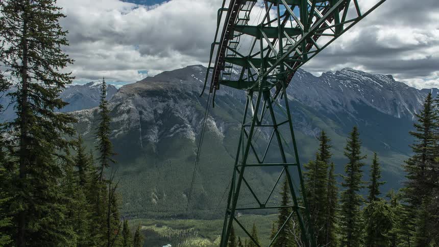 Time lapse of a ski lift moving carriages back and forth