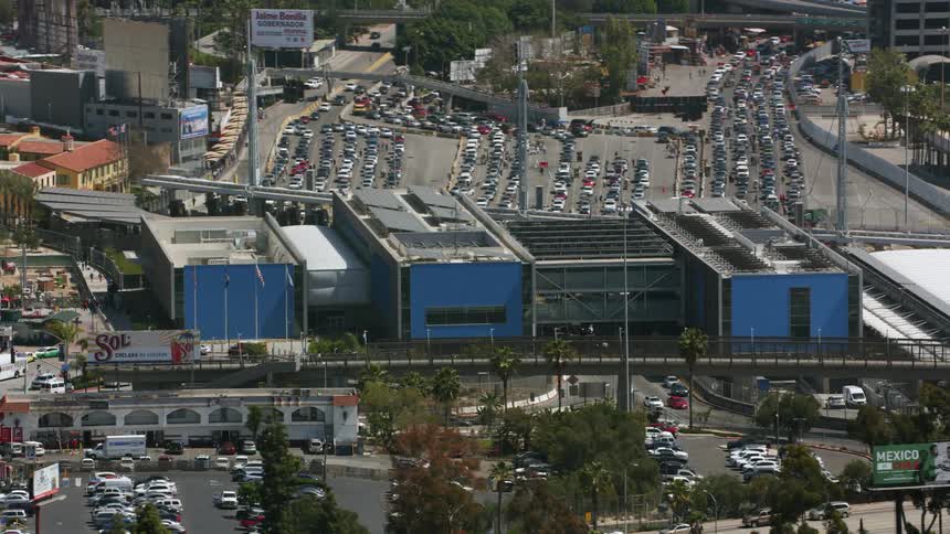 Aerial view of traffic at the border check station between Mexico and USA in Southern California