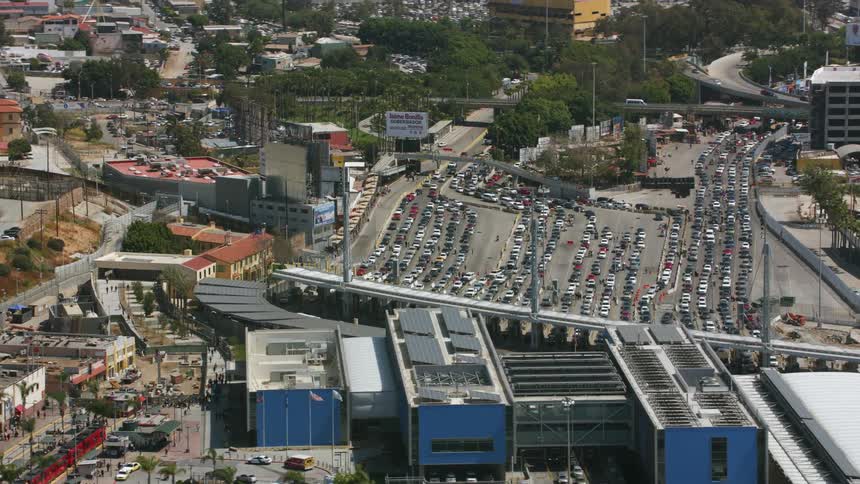 Aerial view of traffic at the border check station between Mexico and USA in Southern California