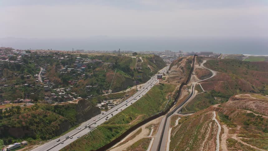 Aerial view of the border wall between Mexico and USA in Southern California