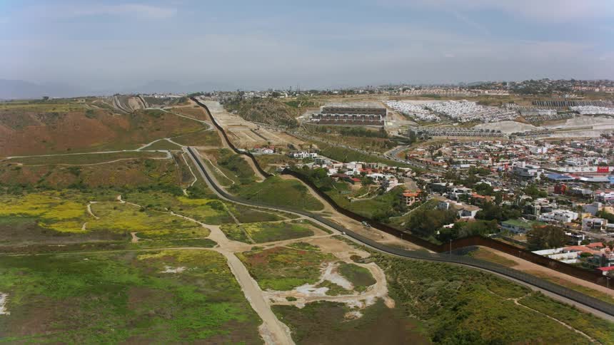 Aerial view of the border wall between Mexico and USA in Southern California
