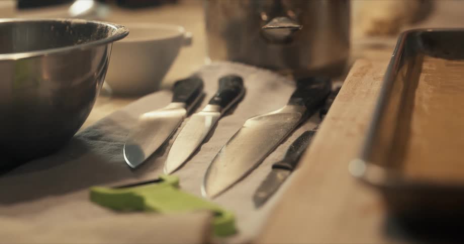 Kitchen utensils arranged on a table