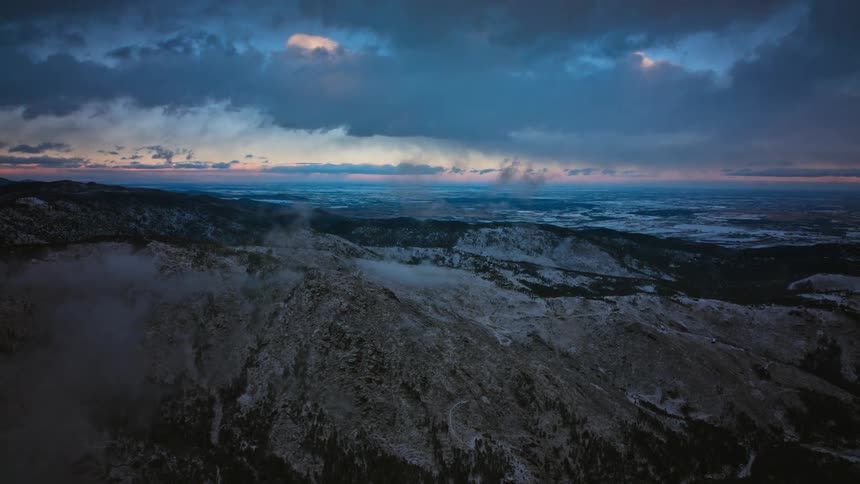 Aerial view of a wide open landscape at dusk
