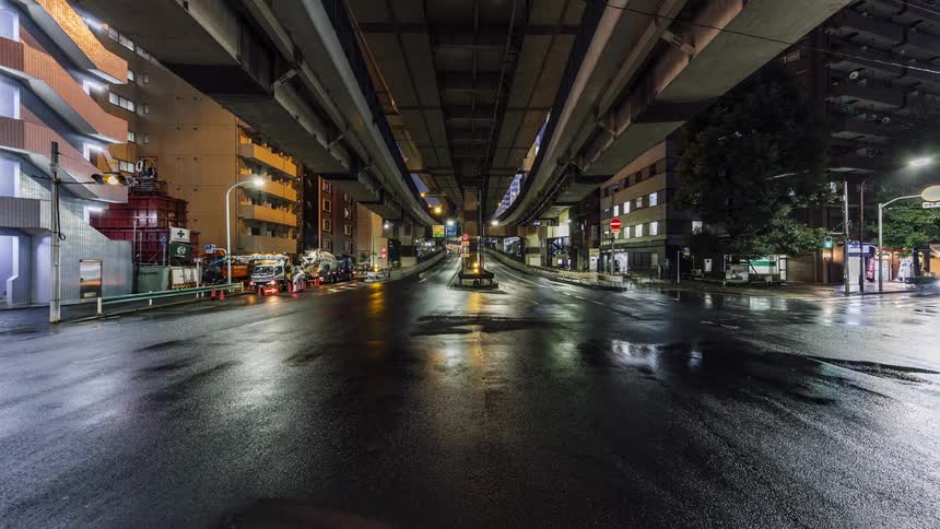 Cars travel under the overpass