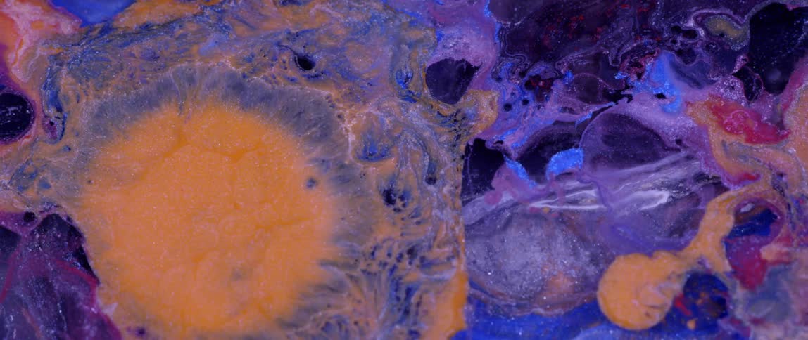 Paint colors are being mixed together