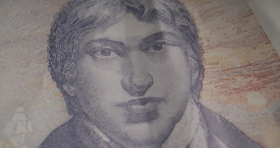 Close up of bank note with famous figure