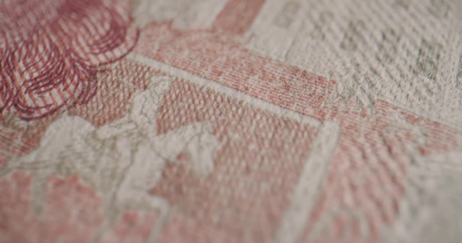 Artwork on a colorful banknote