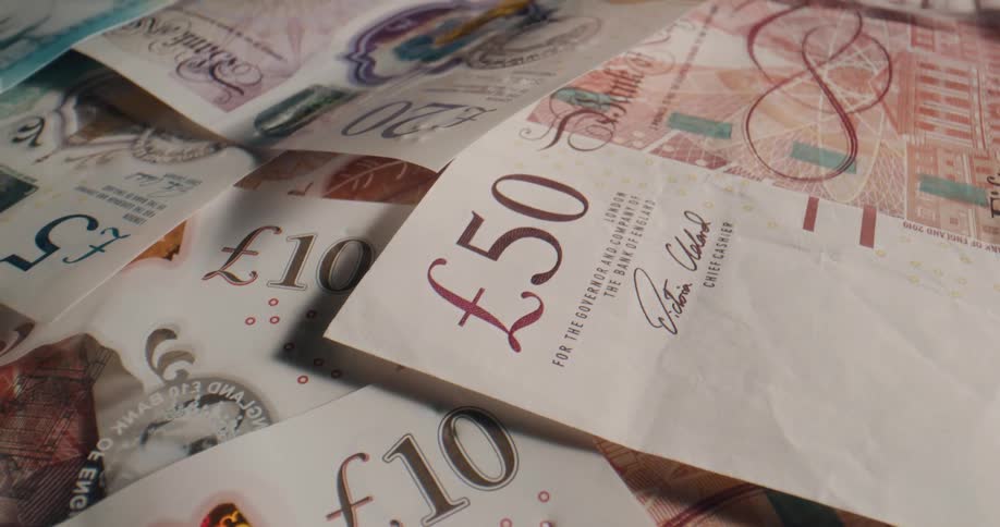 A pile of british banknotes