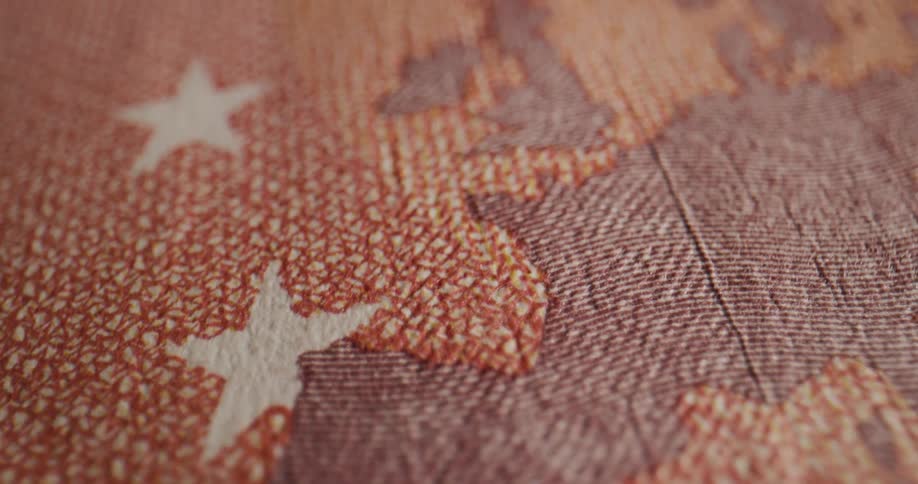 Artwork on a pile of banknotes