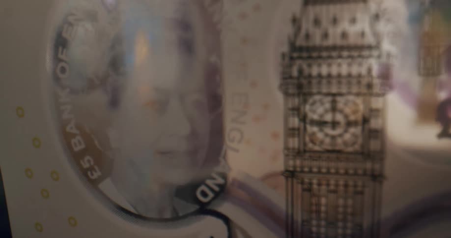 Light is shining on pieces of currency money