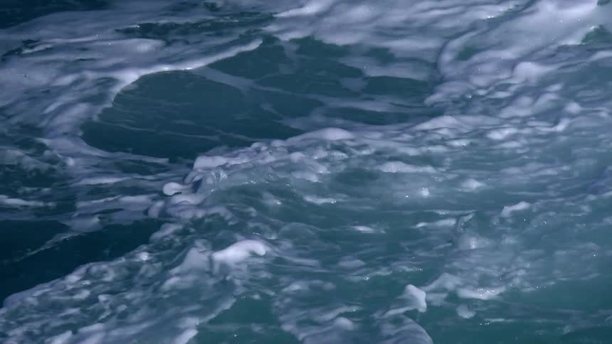Ocean water splashes and churns