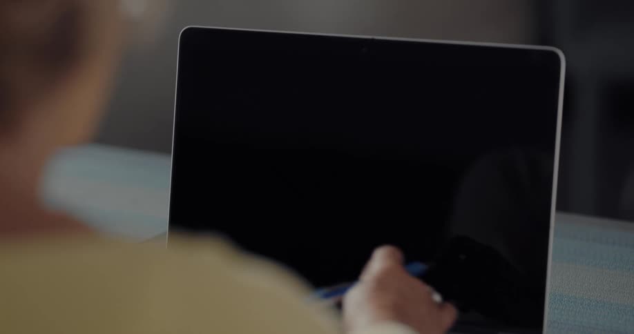 A woman using a laptop