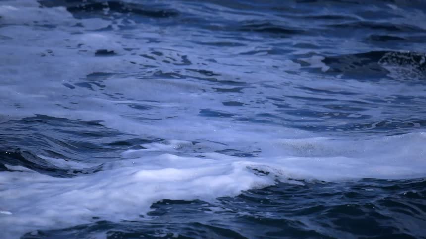 Waves shifting in a body of water