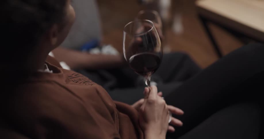Man and woman are drinking some wine